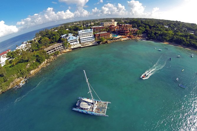 Catamaran Snorkeling All-Inclusive Day-Trip - Stop 2: Sosua Beach snorkeling and sailing with a pro guide