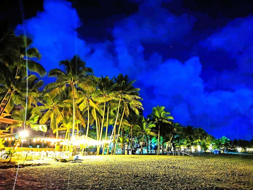 Experience the Nightlife: Puerto Plata + Sosua + Cabarete - Cabarete by night: beach boulevard energy with discos and palm trees
