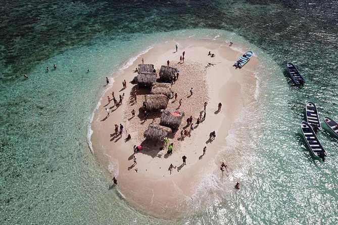 Full-Day Tour to Punta Rucia and Cayo Arena with Snorkeling - Return route and the local market stop in Puerto Plata Province